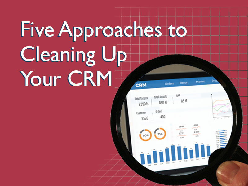 Magnifying glass over a CRM screen to illustrate cleaning up your CRM to be effective