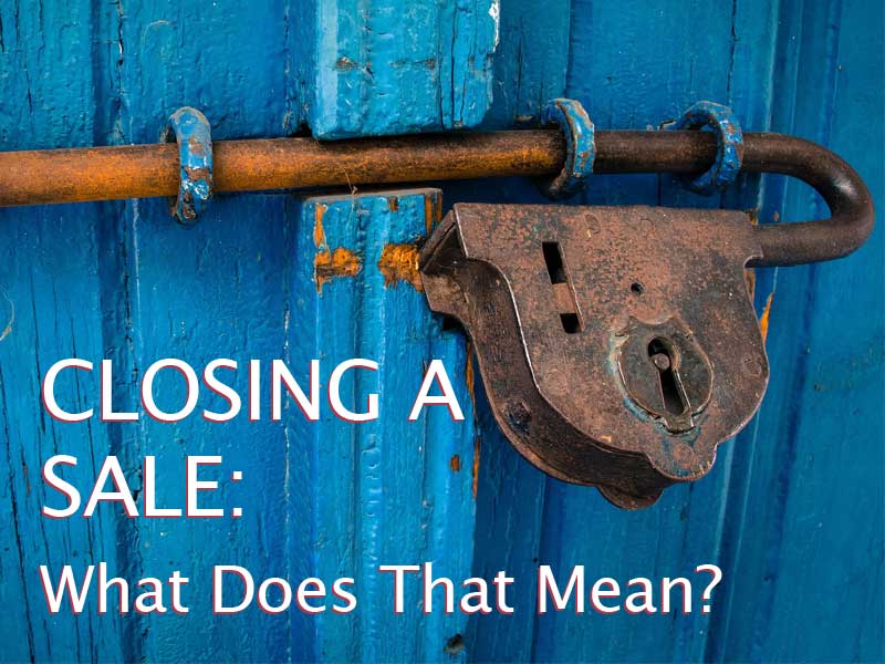 image of a padlocked door to illustrate What does closing a sale mean?
